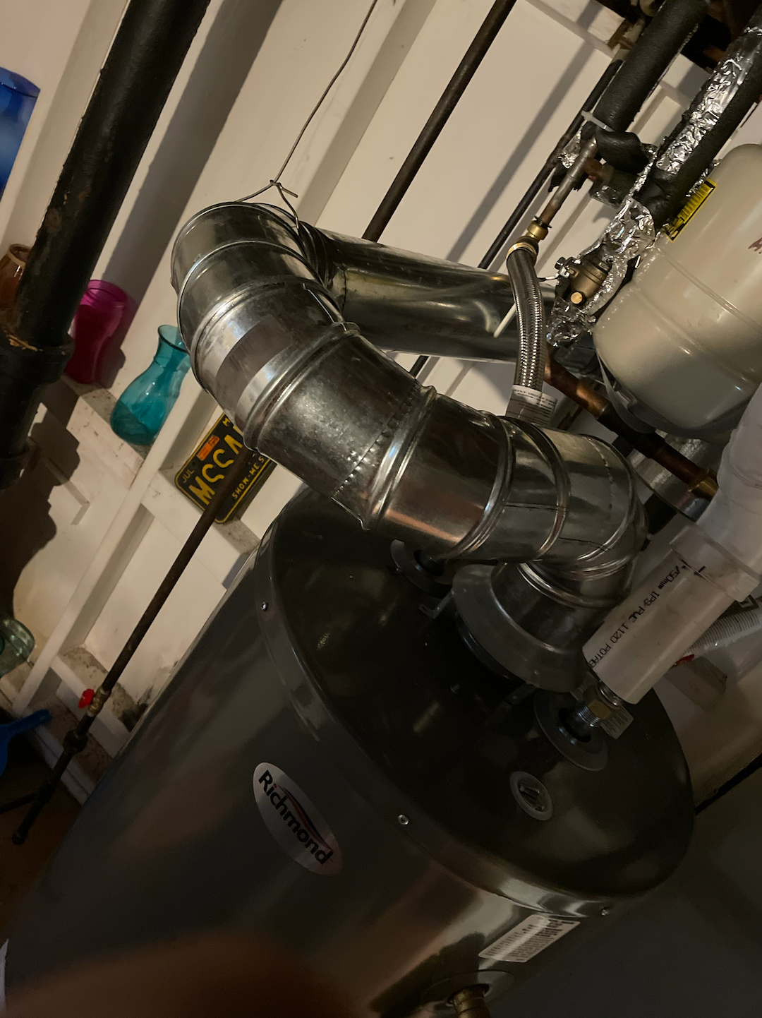 Standard Atmospheric water heater with too many fittings and no rise in the vent run