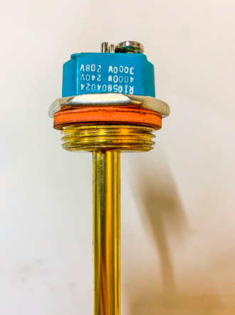 Water heater element head with dual voltage and wattage information