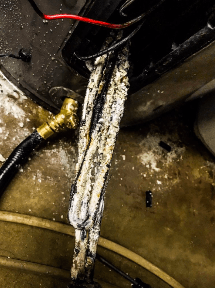 water heater element filled with sediment build-up