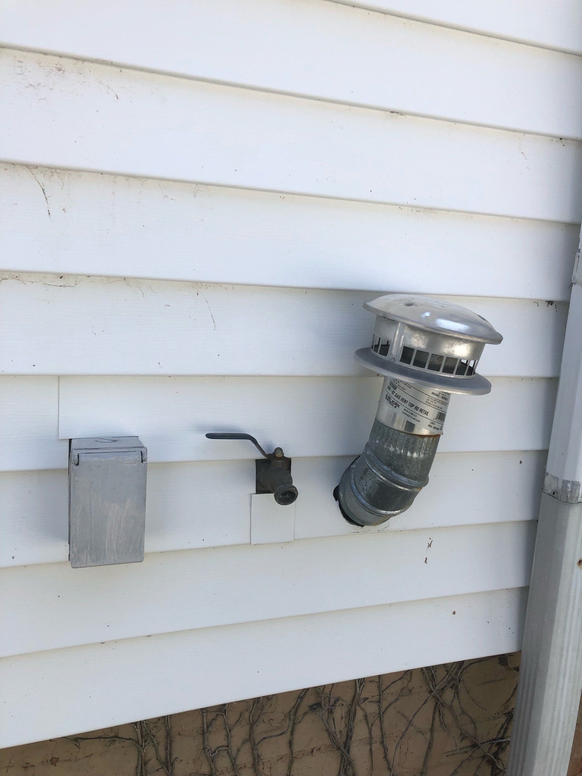 Improper water heater venting termination