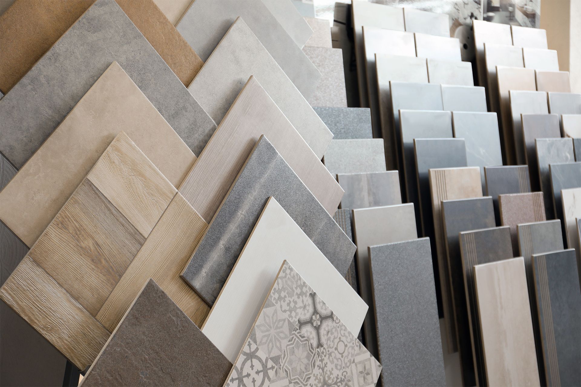 Display of various tile samples in different colors and patterns.