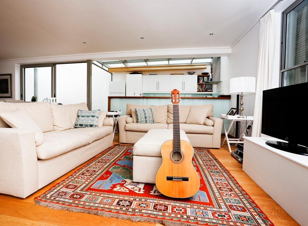 Classic Acoustic Guitar — Virginia Beach, VA — Artin Hadjinlian Oriental Rug Cleaning And Restoration