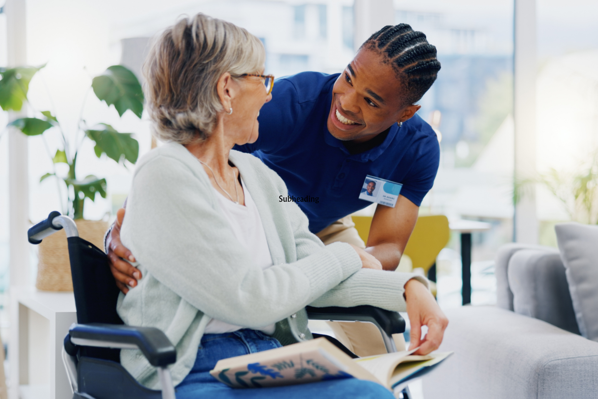 A caregiver helping an elderly man take his medication