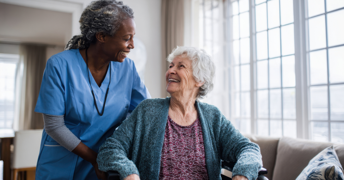 A smiling caregiver and patient