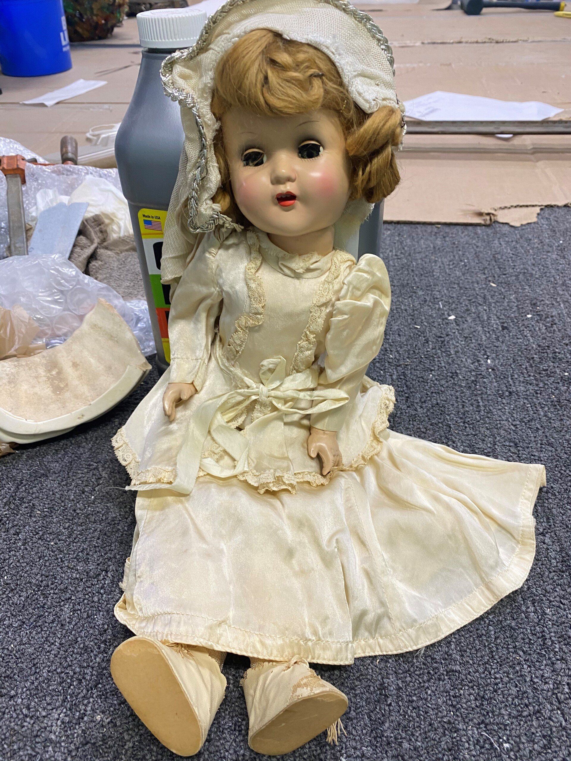 Doll Sitting — Tampa, FL — Antique Restoration and Design