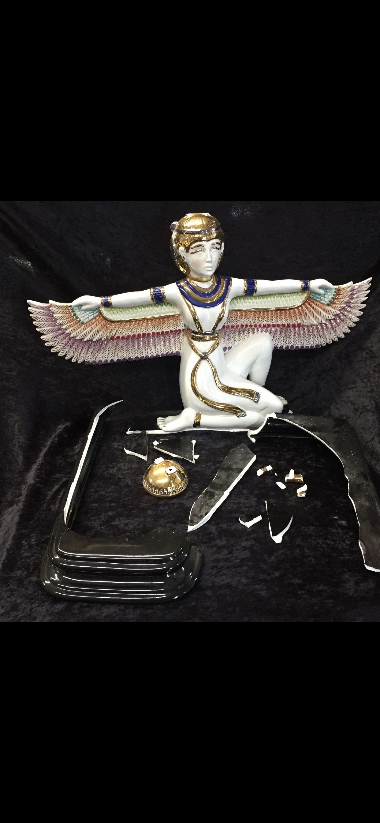 Figurine Back Feather — Tampa, FL — Antique Restoration and Design