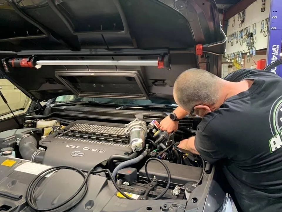 Mechanic Working Under the Hood — Mechanic in Cessnock