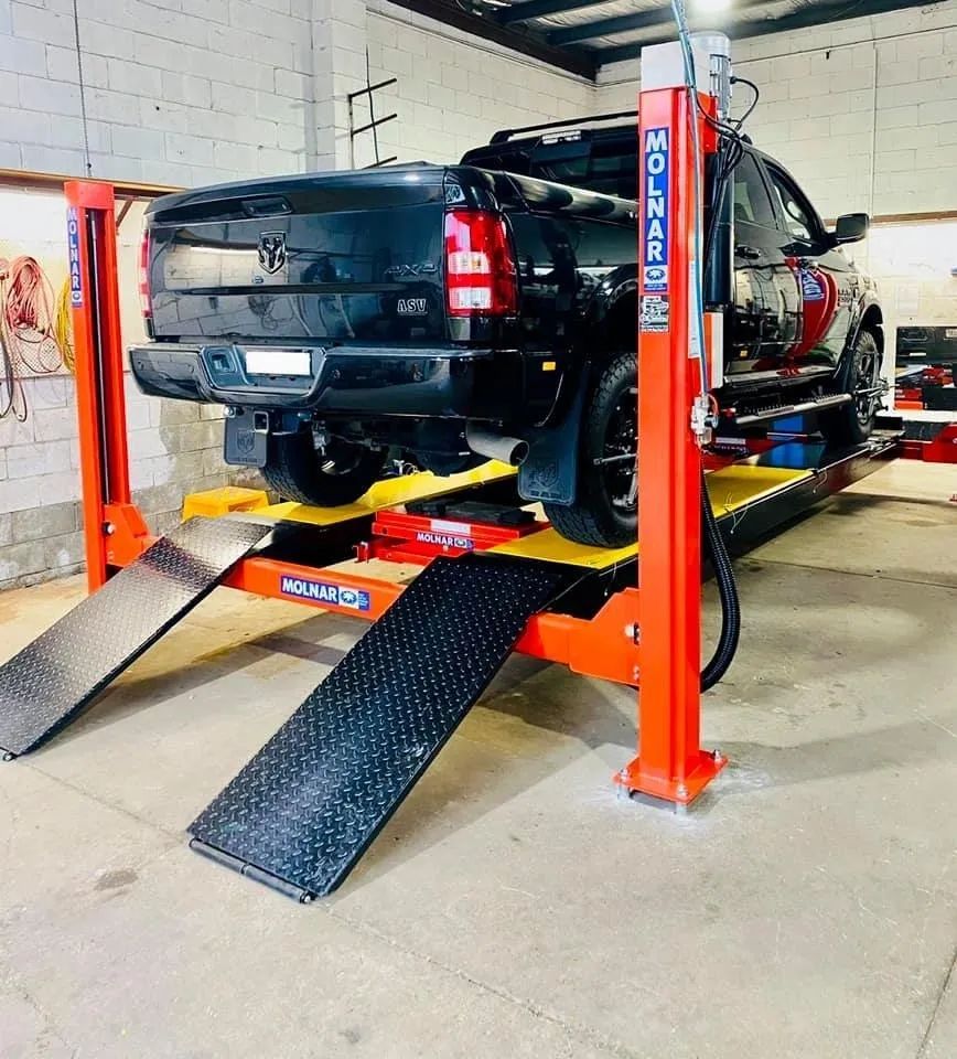 Black Ute Lifted Up — Mechanic in Cessnock