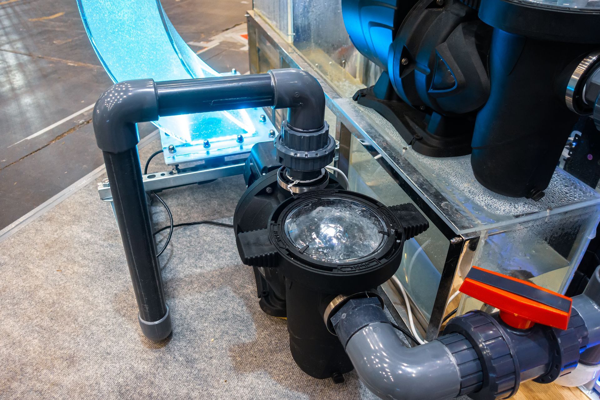 A swimming pool pump with a prefilter.