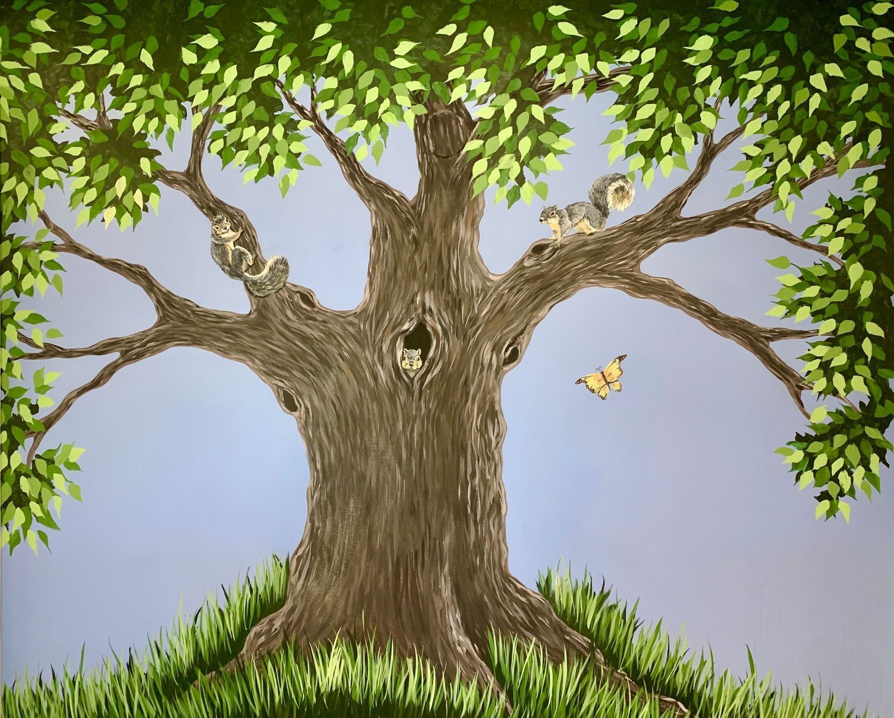 Painting of a leafy tree in a pediatricians office