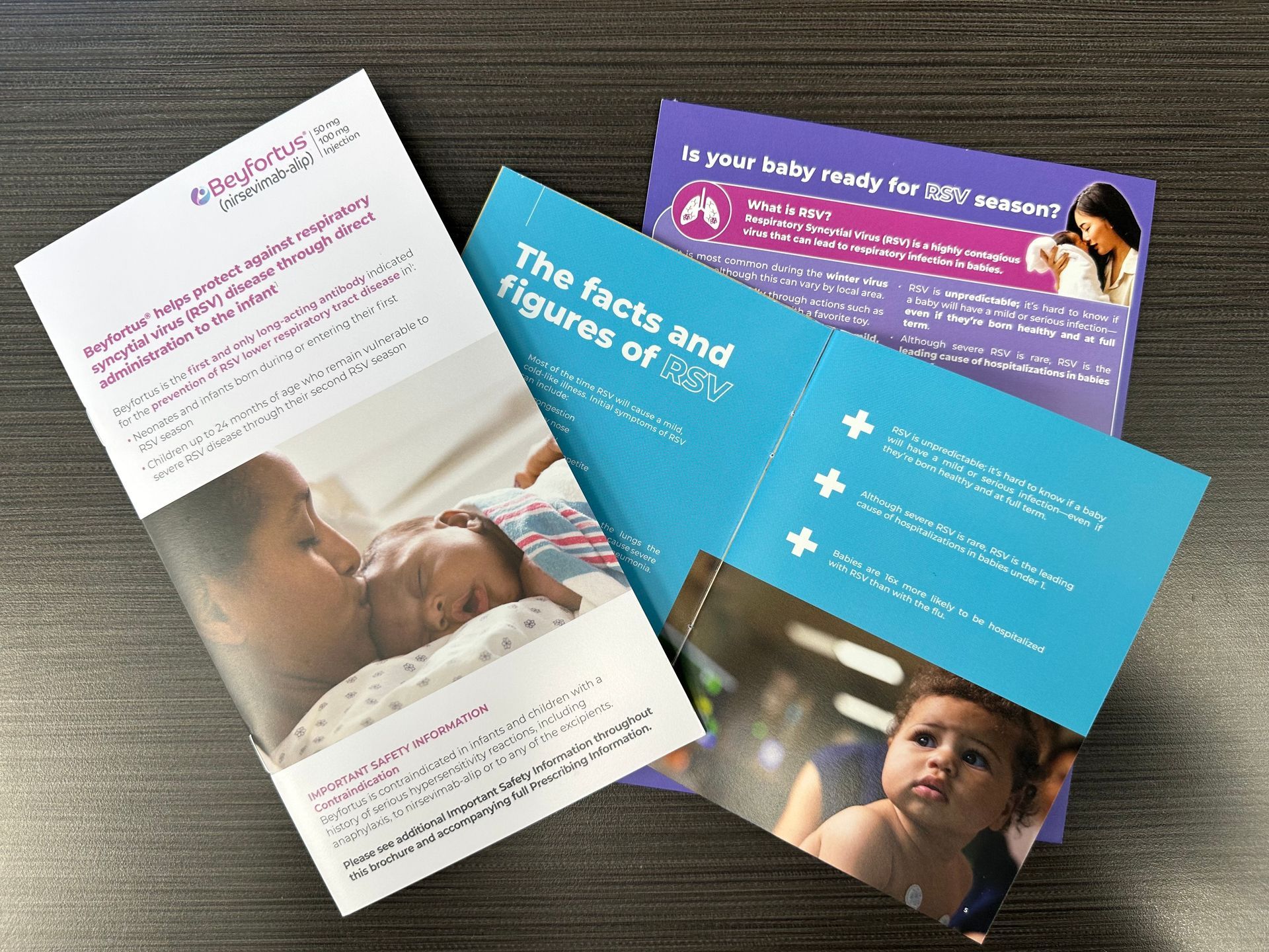 A brochure about breastfeeding is sitting on a table.