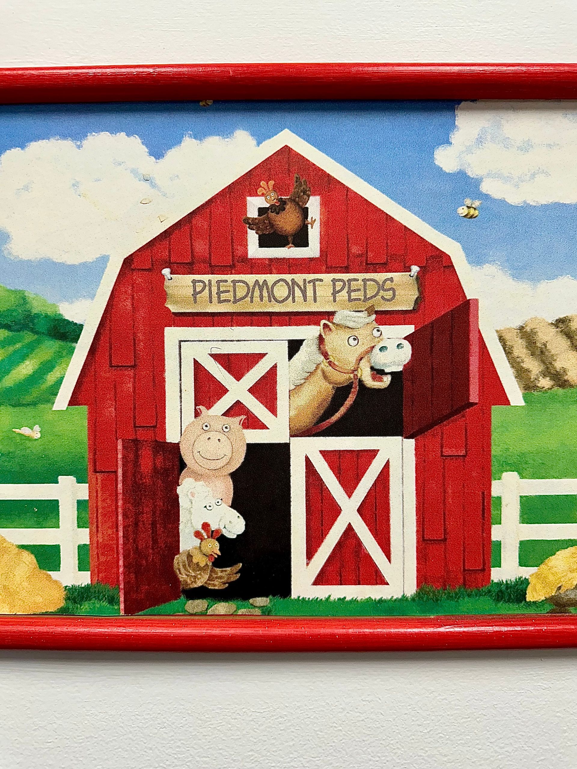 A picture of a red barn with a sign that says piedmont peds