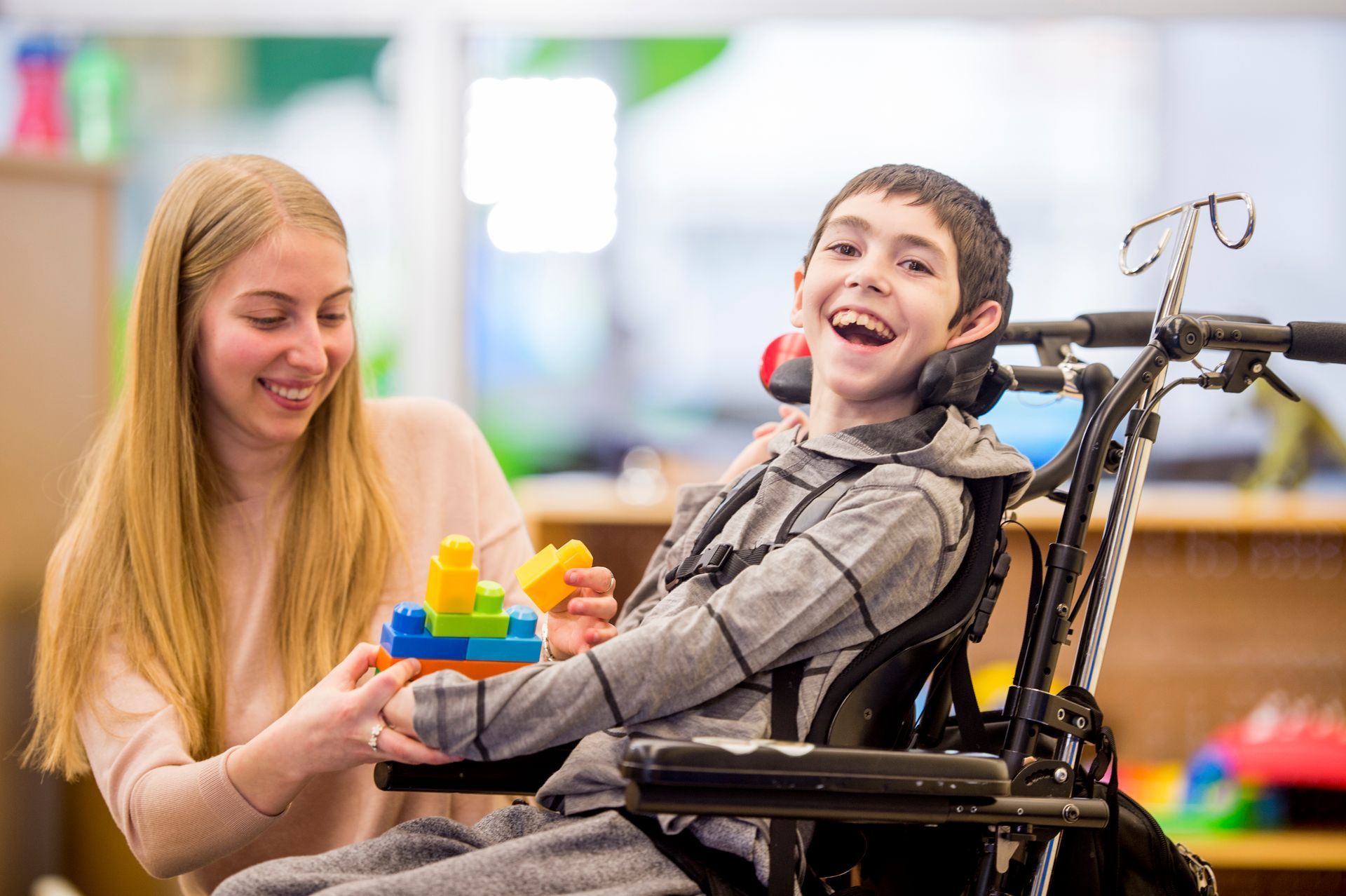 Smiling Boy in a Wheelchair