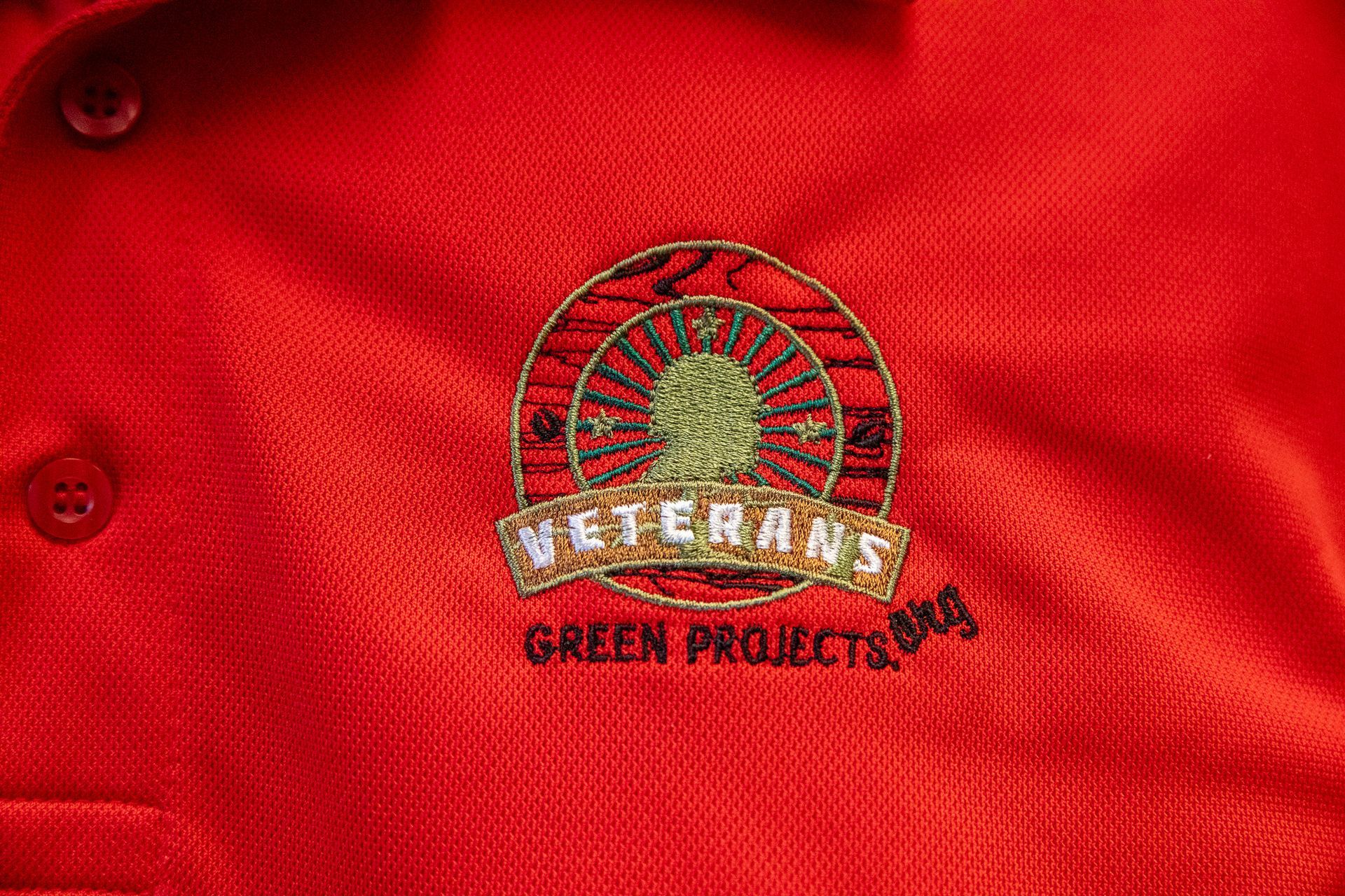 Red shirt with embroidered logo: