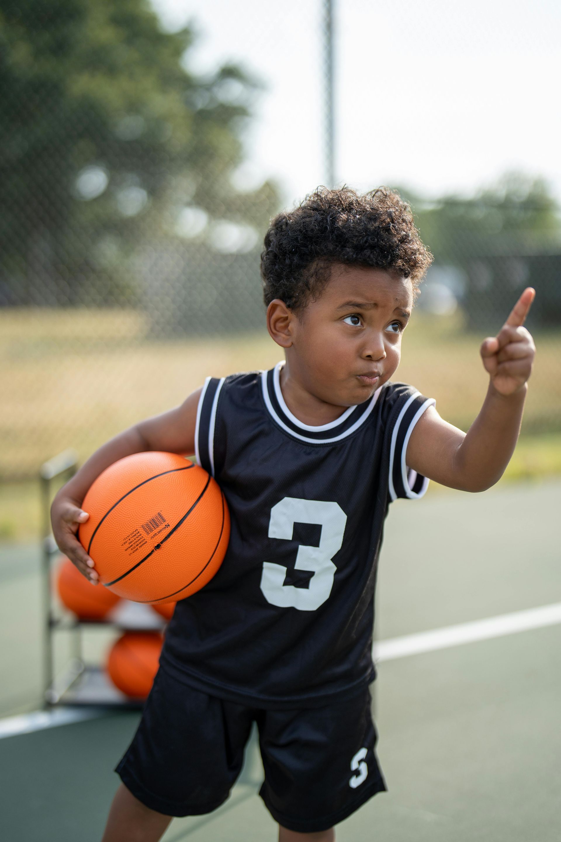 Basketball on hardwood court symbolizing a fresh start, growth, teamwork, and learning from mistakes