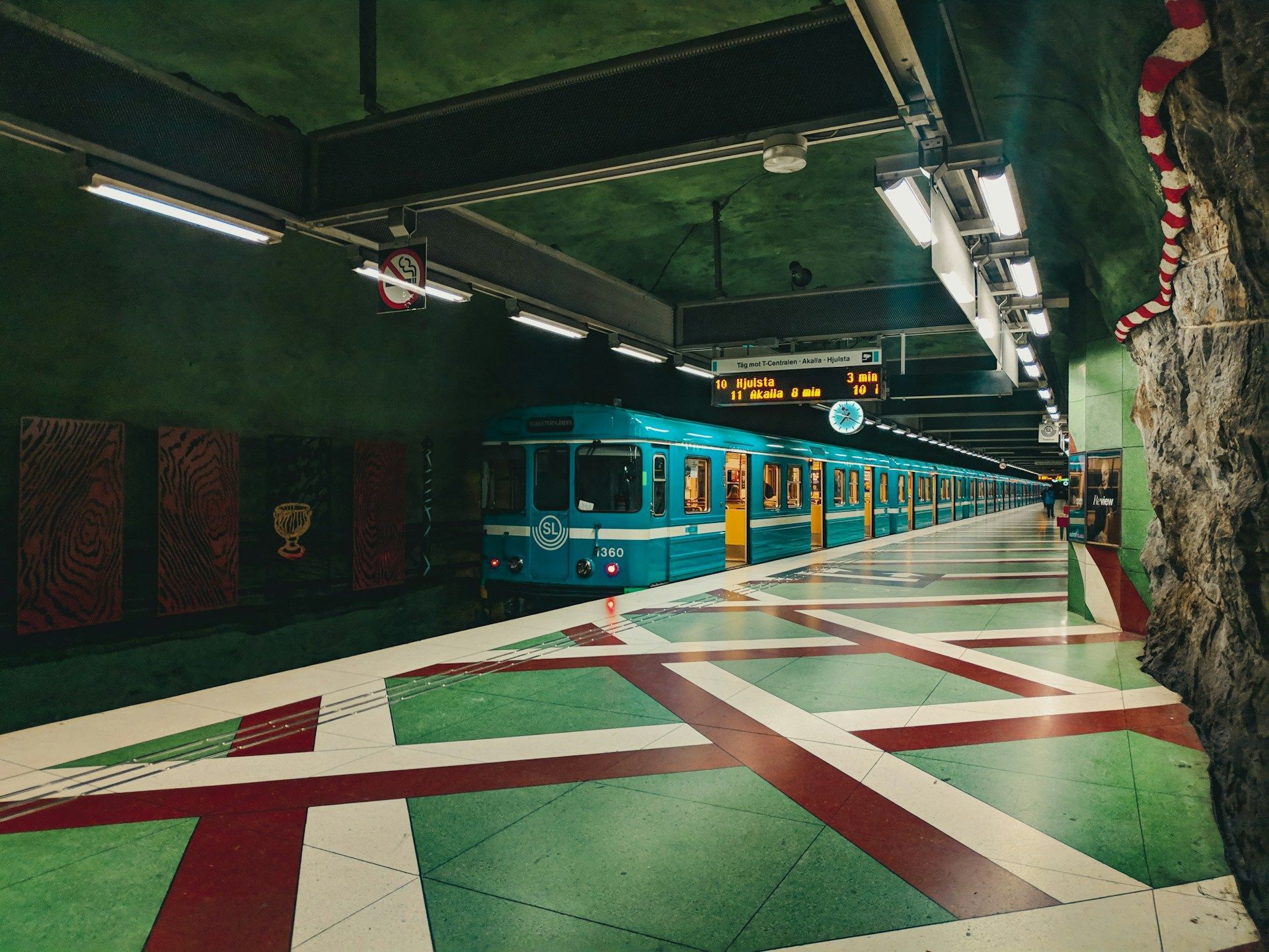 Kungsträdgården metro station in Stockholm with its old subway trains.