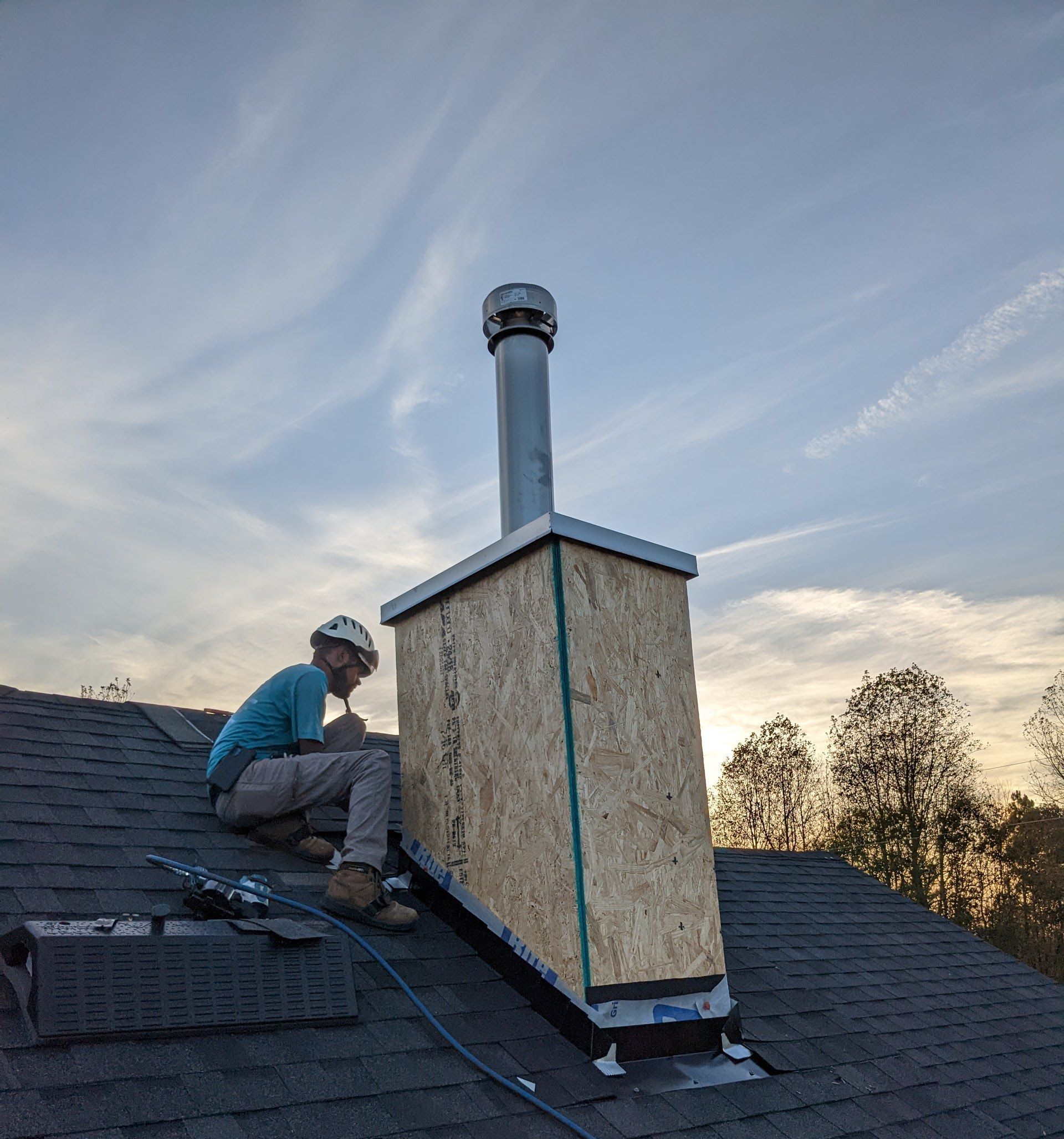 Top Hat Chimney Sweeps installing a new chimney