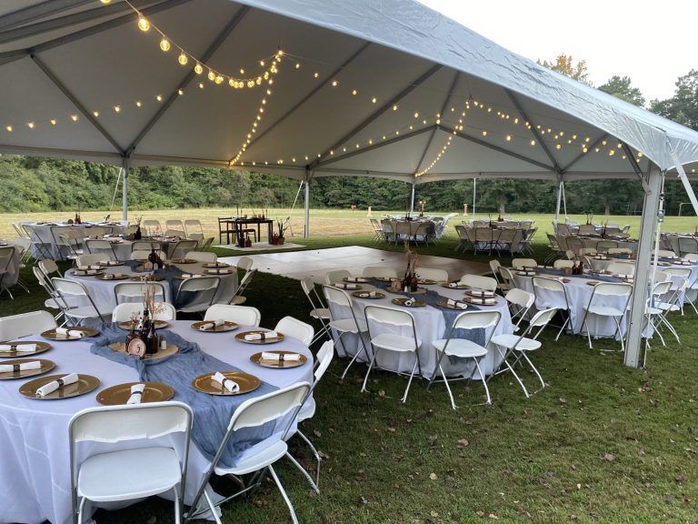 A large tent with tables and chairs underneath it | Southern MD
