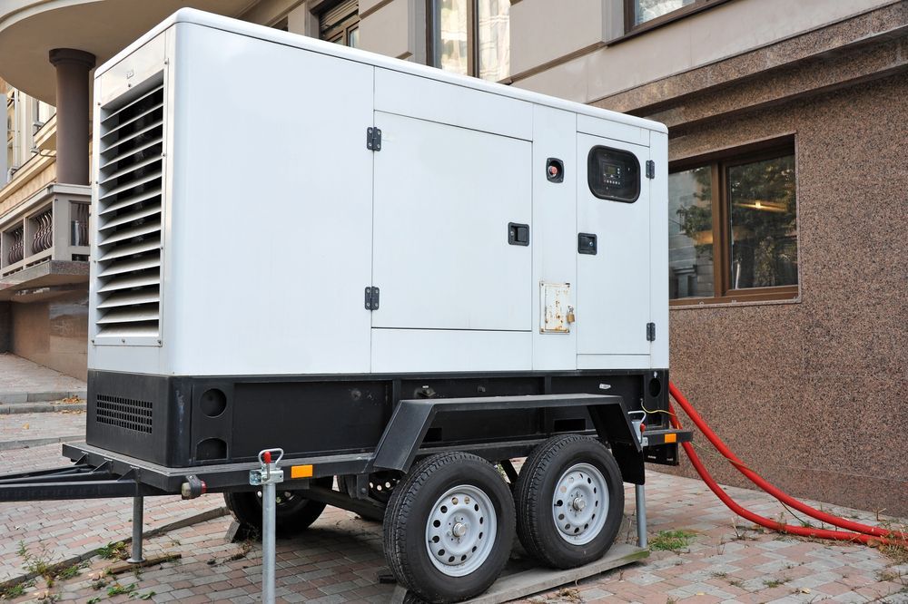 White Trailer Parked Beside a Building — Mingweld Fabrication in Bungalow, QLD