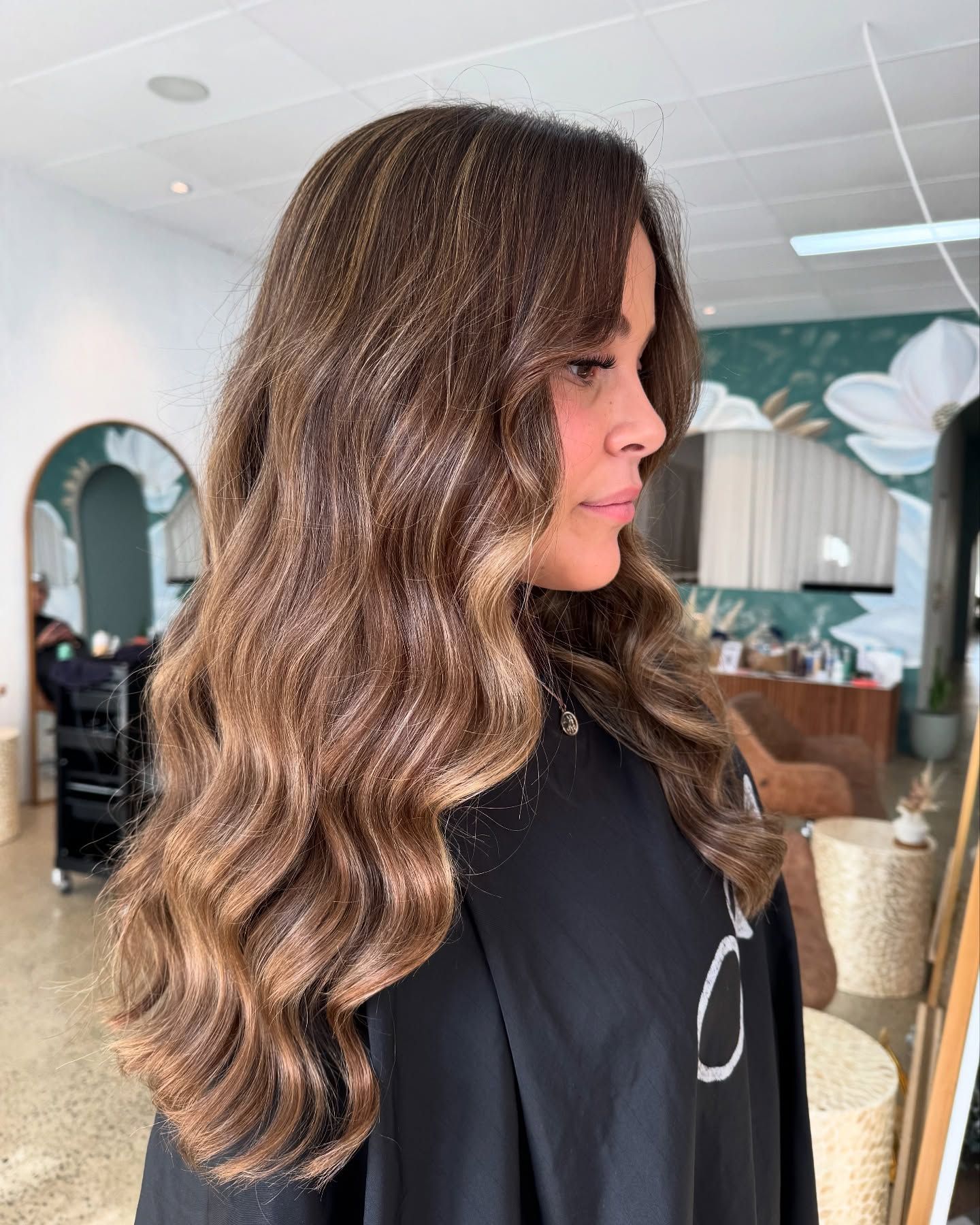 A Woman is Dying a Woman 's Hair in a Salon — Tree House Salon In Nerang, QLD
