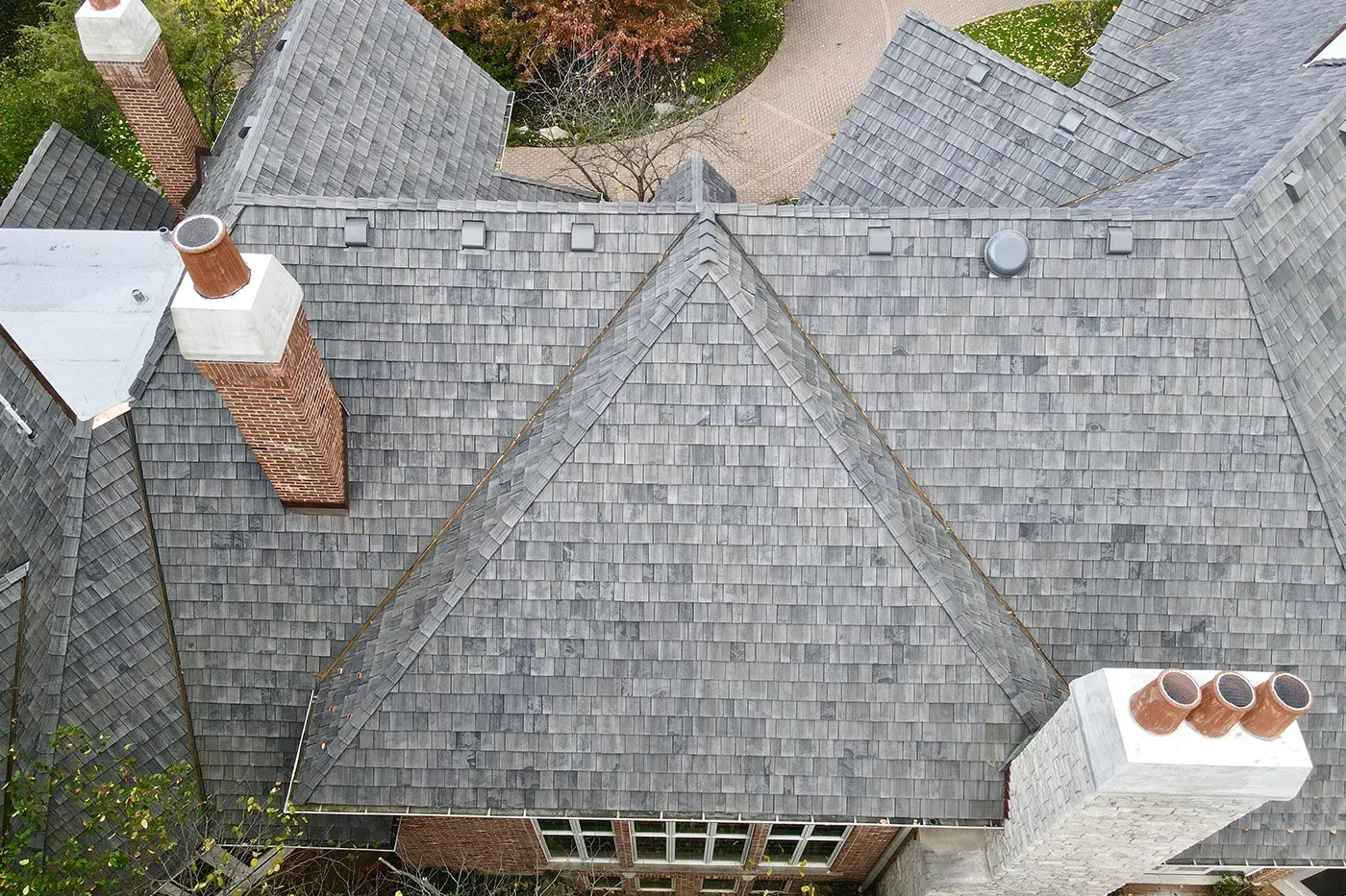 Cedar shake-inspired Brava roof installed on a Georgia home using advanced composite roofing materials.