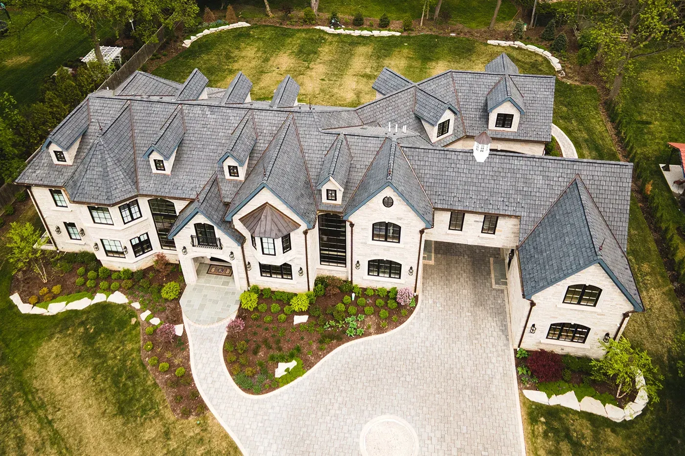 Brava slate roof installation showcasing refined lines and premium roofing craftsmanship.
