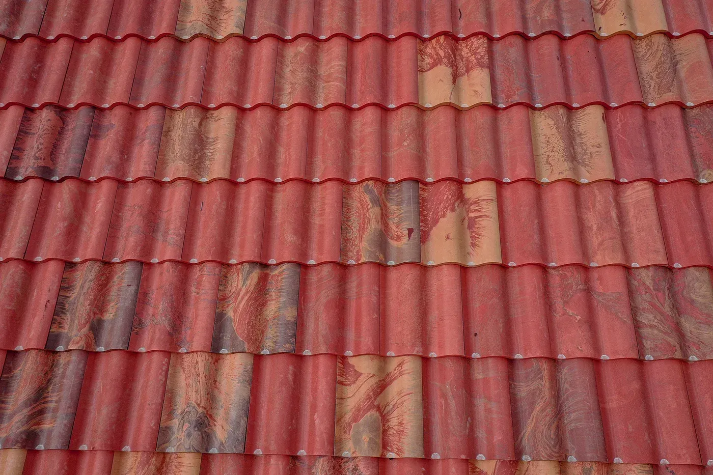 Spanish clay tile style Brava roof with curved profiles and warm architectural character.