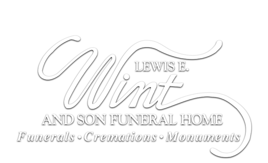 Lewis H. Vint and Son Funeral Home logo in white script with funeral and monument services text