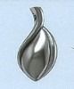 Silver abstract flame-shaped metal sculpture on a light background