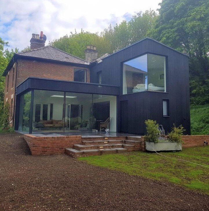 Esdon Architecture. Two storey farmhouse extension. Charred Accoya. Structural glazing. Salisbury, Wiltshire.