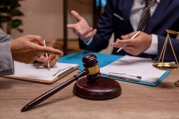Lawyer and Client Discussion — Fort Myers, FL — Lynn Law Group Lawyer and Client Discussion — Fort Myers, FL — Lynn Law Group