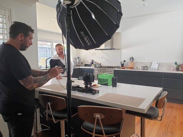 Behind the scenes look at a video shoot in progress.