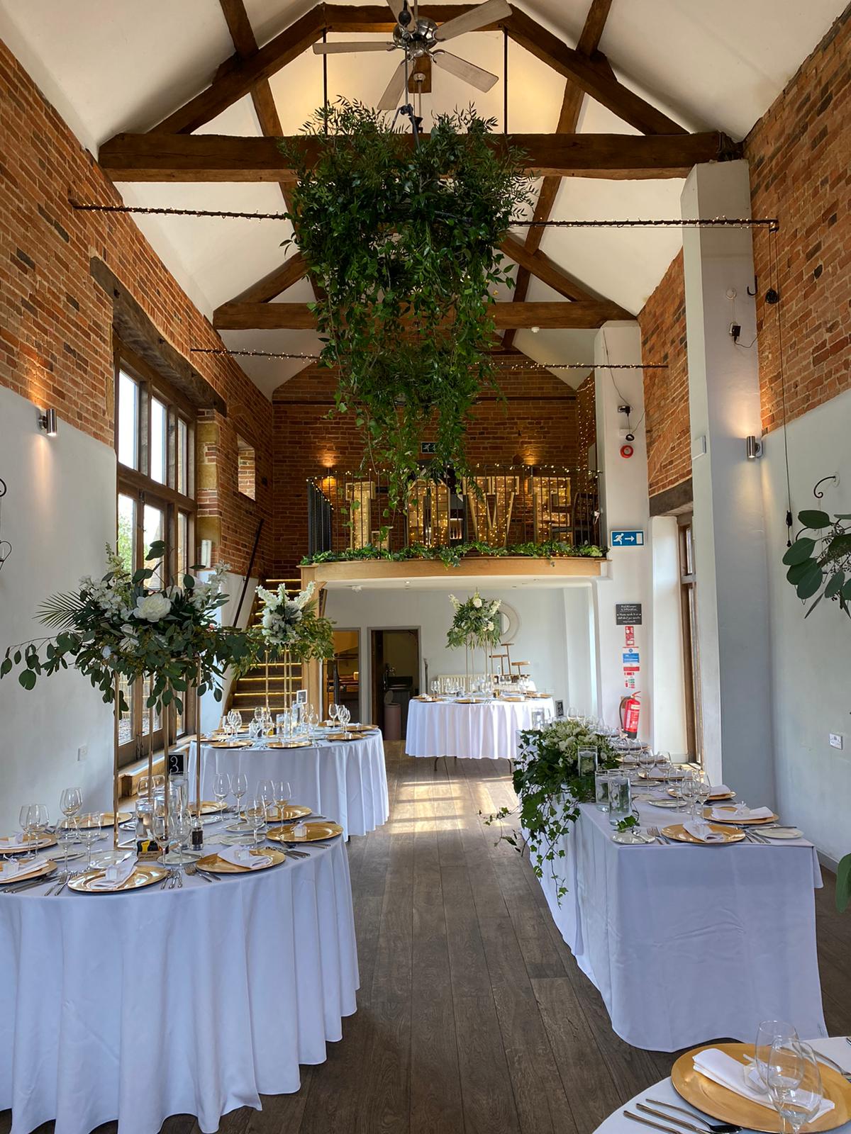 Hanging floral arrangements for weddings