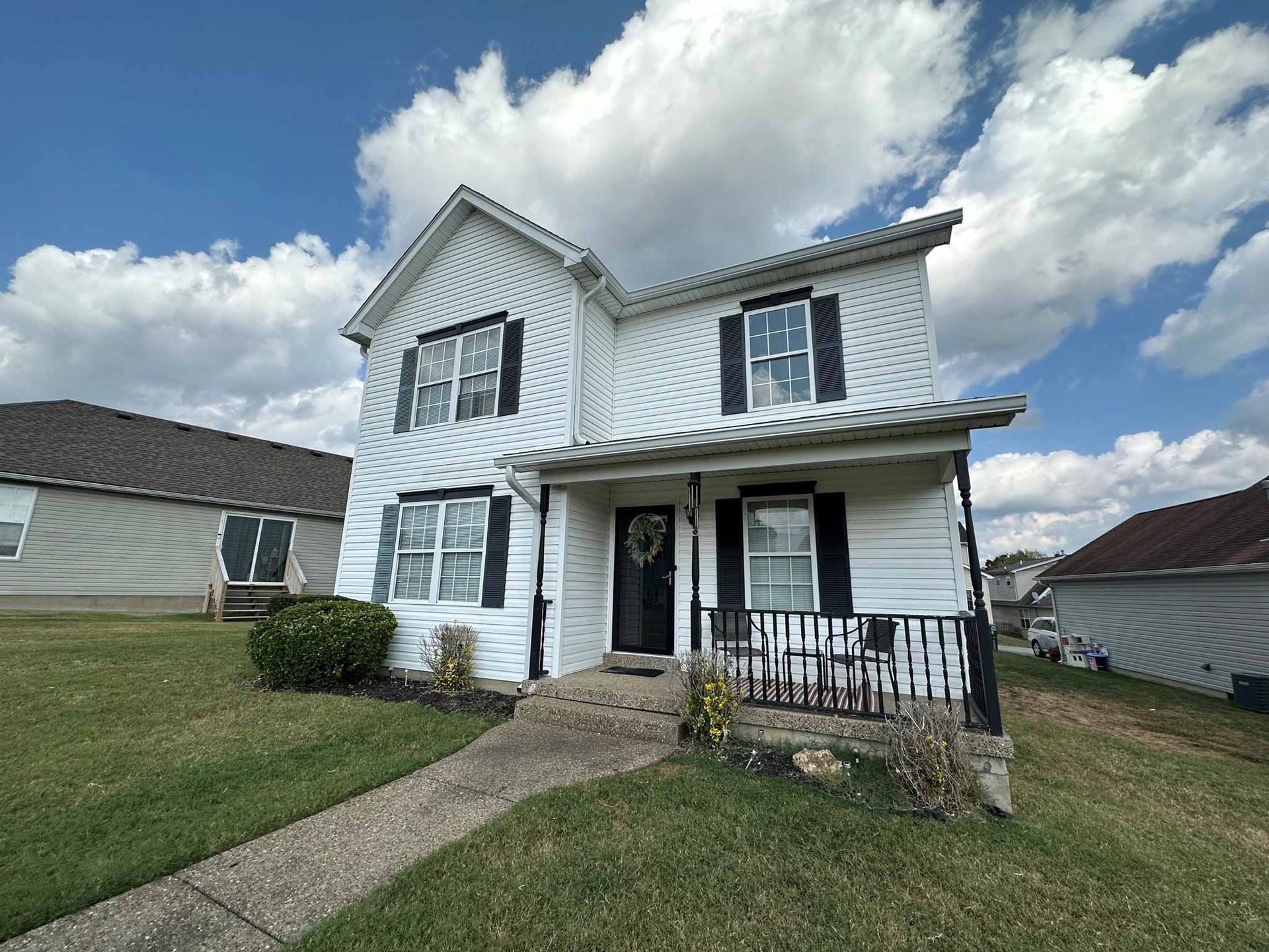 White residential house — Brandenburg, KY — Herencia Construction LLC