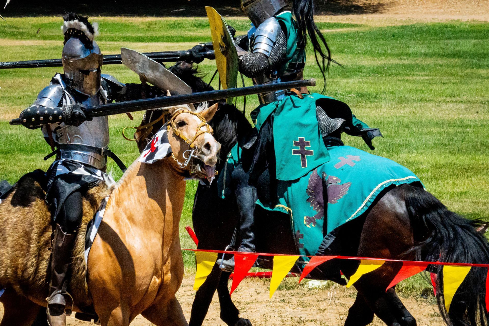 two knights battling on horseback at Yosemite Chivalry & Fantasy Festival Joust Tournament.