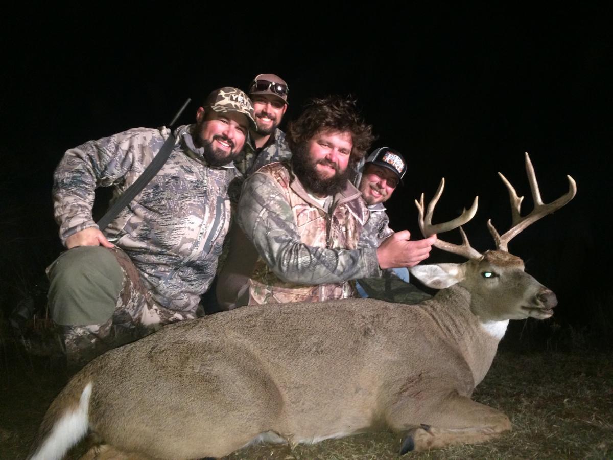 Men with a trophy deer from Salt Fork Hunts