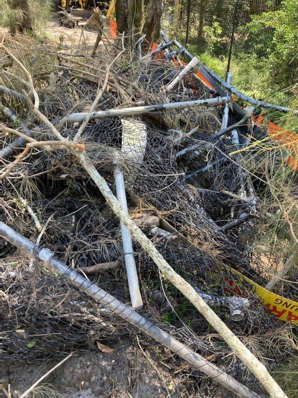 A Pile Of Branches And Pipes In The Middle Of A Forest — East Coast Metal Recycling In Southport, QLD
