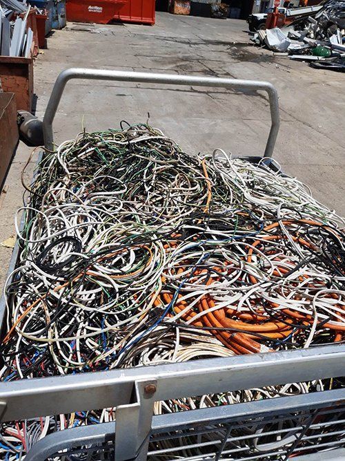A Cart Filled With A Bunch Of Wires And Cables — East Coast Metal Recycling In Southport, QLD