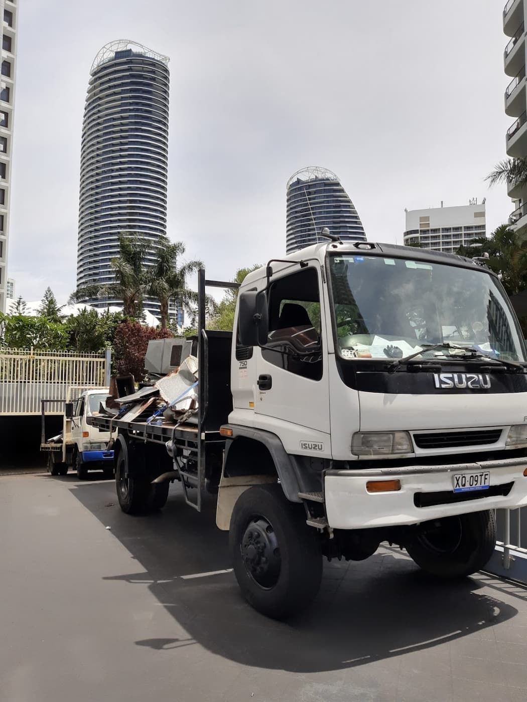 A White Truck Is Parked On The Side Of The Road — East Coast Metal Recycling In Tugun, QLD