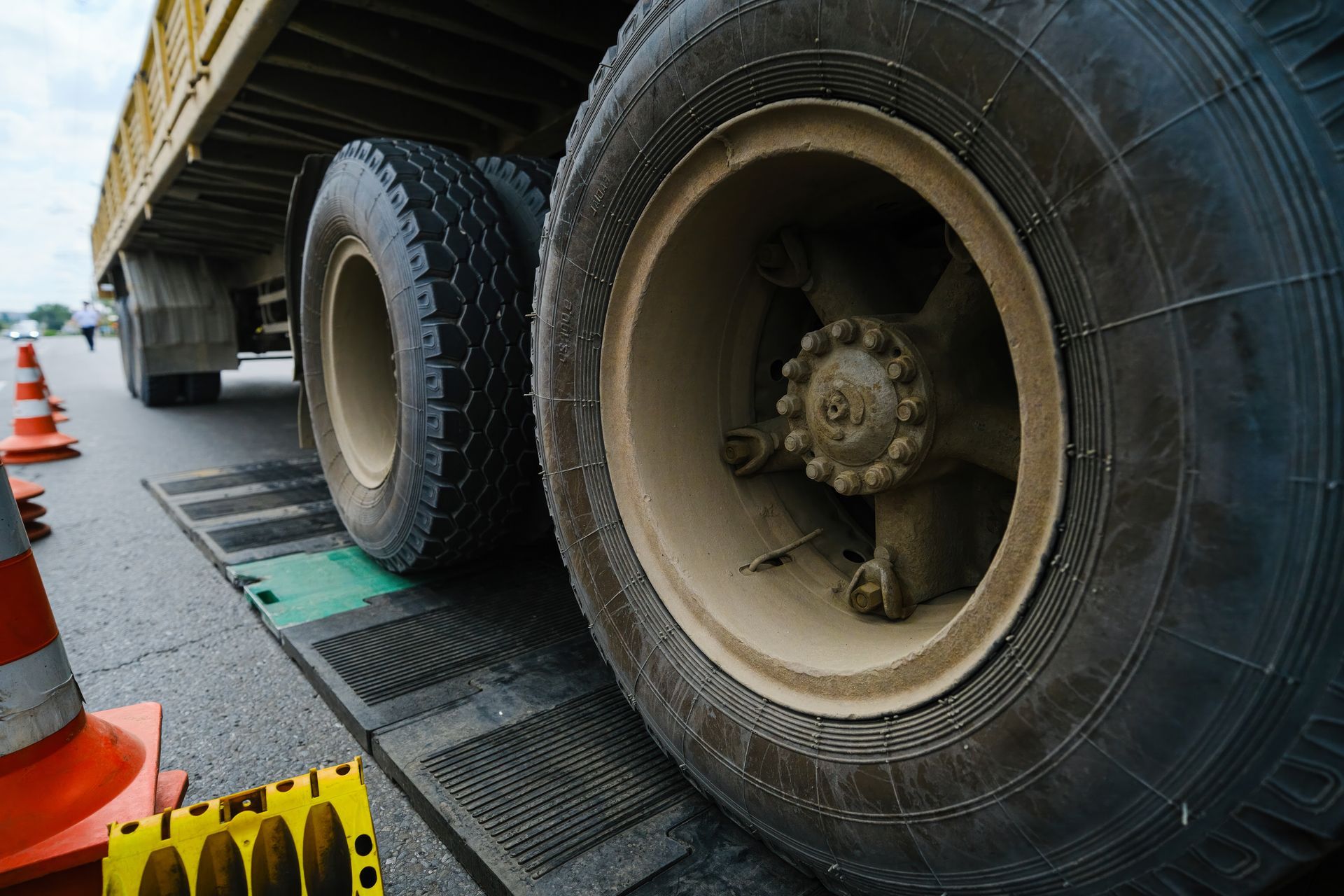Close-up of a truck on an electronic scale for weighing trucks.