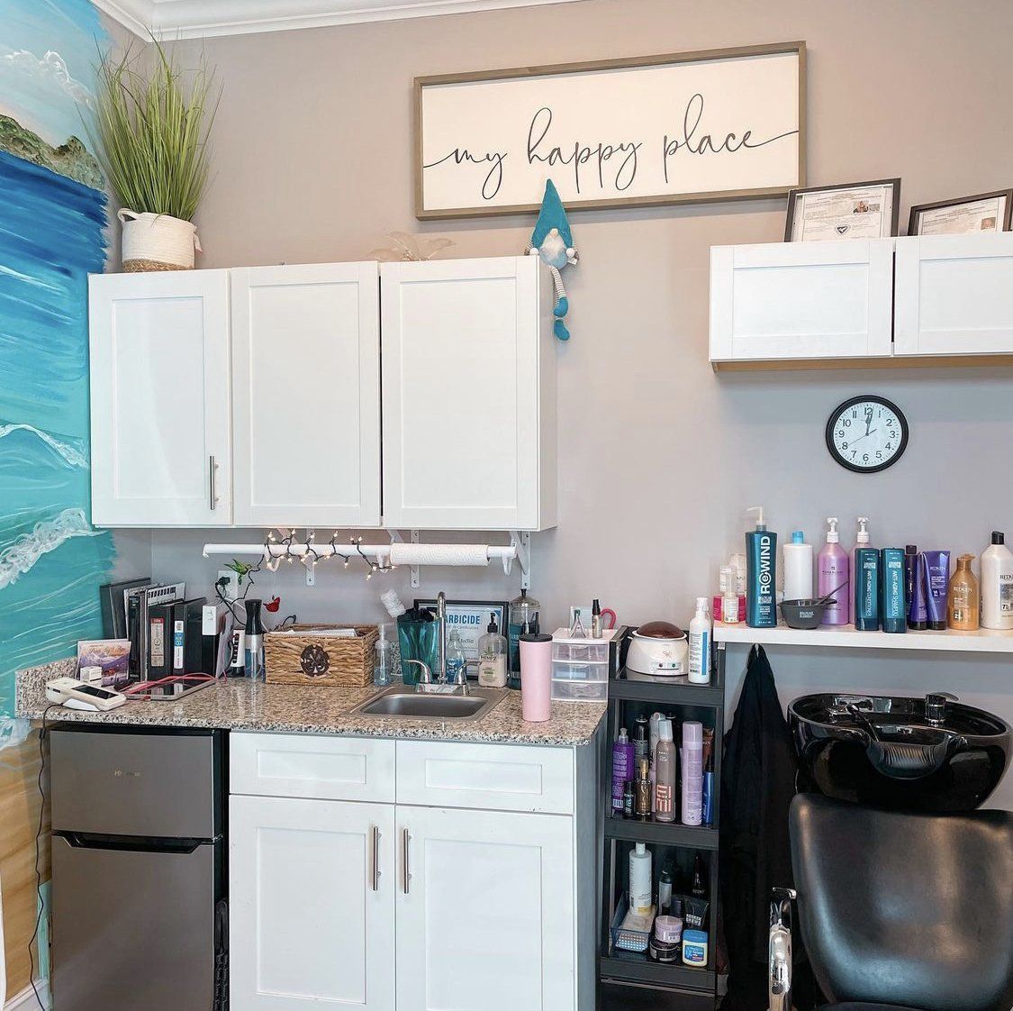 A kitchen with a sign that says my happy place