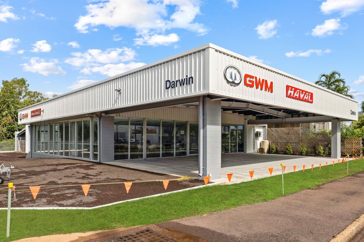 GWM Haval car dealership in Darwin, Australia, with signage and a modern exterior under a blue sky.