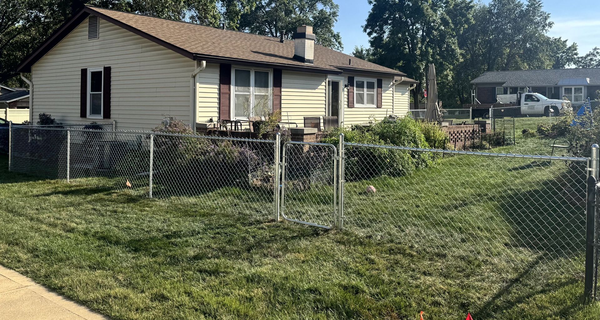 Residential chain link fence installed for an Oakville homeowner