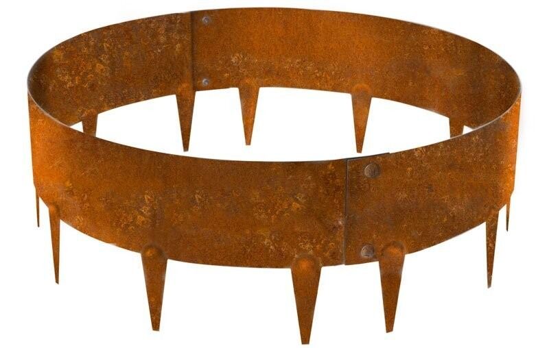 Rusty metal ring with downward-pointing spikes, like a medieval torture device or fire pit guard