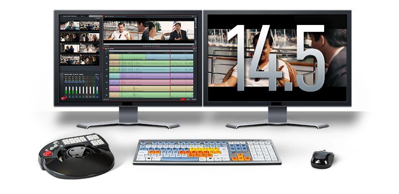 Two computer monitors along with two keyboards and a mouse sit on a white surface with a white background. On one of the monitors the Lightworks software interface is displayed. On the computer monitor to the right of that one, the number 14.5 is displayed, in front of a still image from the movie 