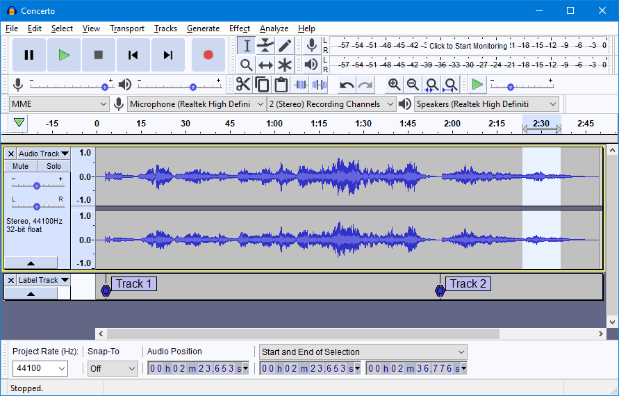 A computer screen shows the Audacity software interface, with two sound recording audio waves on two tracks shown.