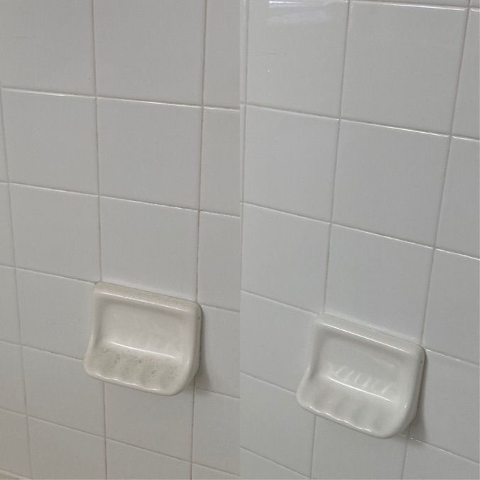 Before and after of a cleaned white tile wall with a soap dish, showing stain removal.