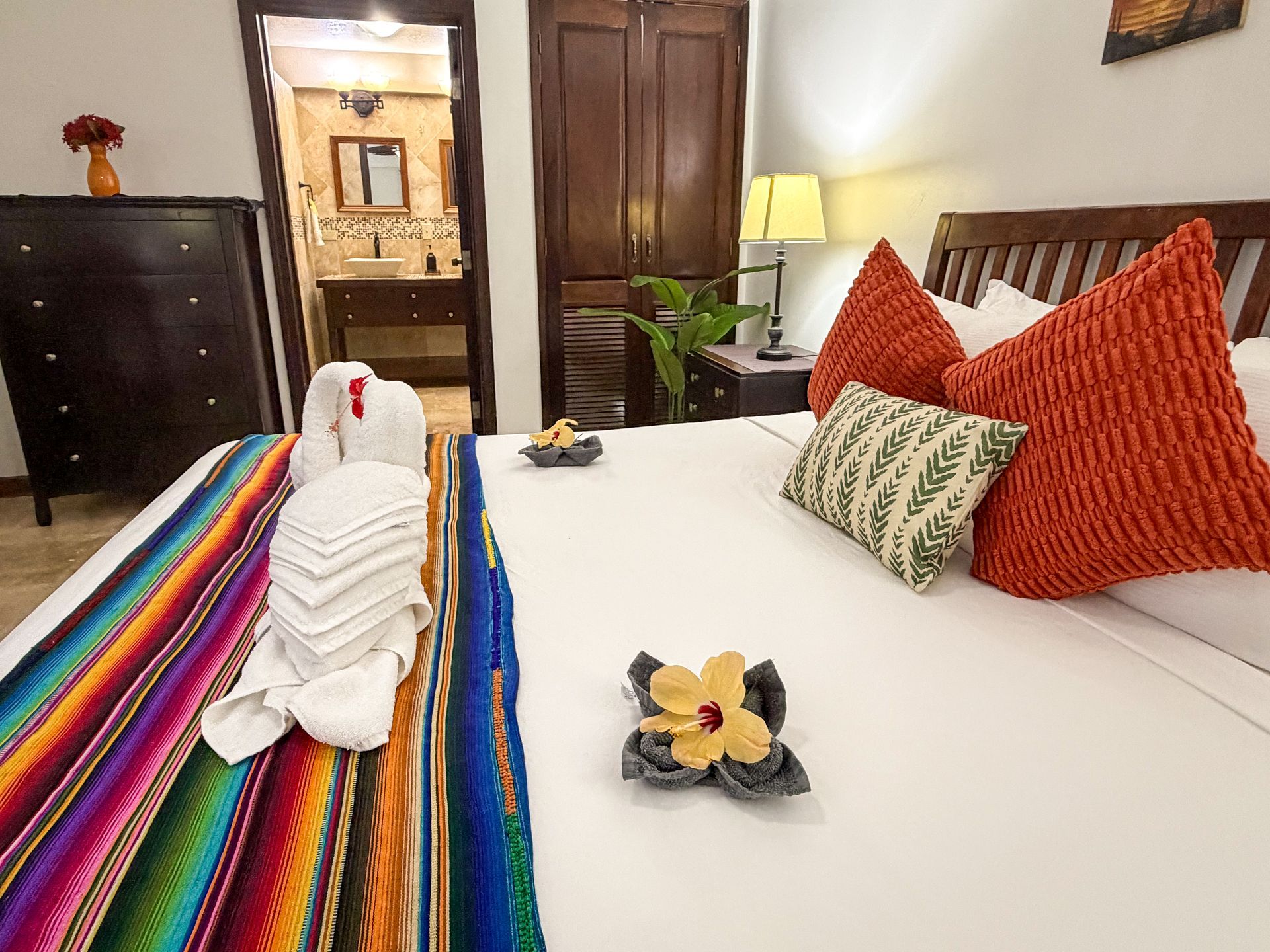 Guest king room with air conditioning, smart TV and mini fridge at Caribbean Shores B&B
