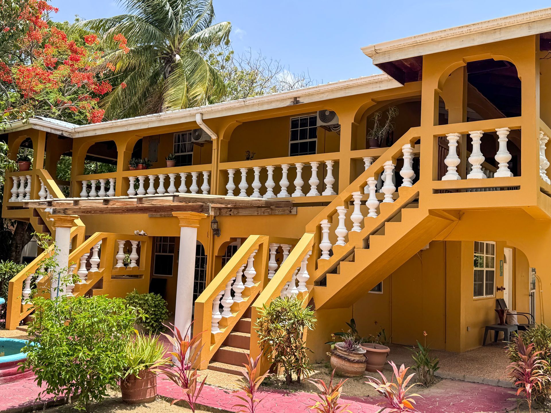 Caribbean Shores B&B two-story guest accommodation building in Hopkins, Belize