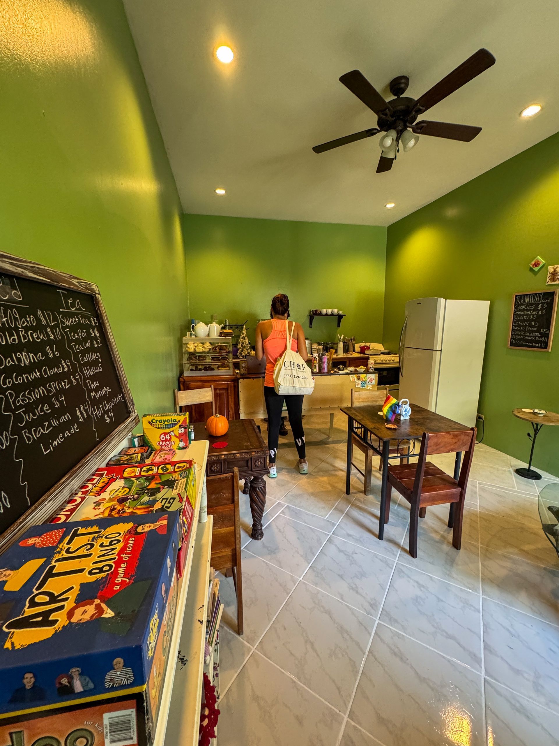 Guest buying coffee at Rainy Day Cafe at Caribbean Village Hopkins 